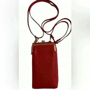 A Forever Young red woman’s,Crossbody bag / wallet with attached iPhone carrier.